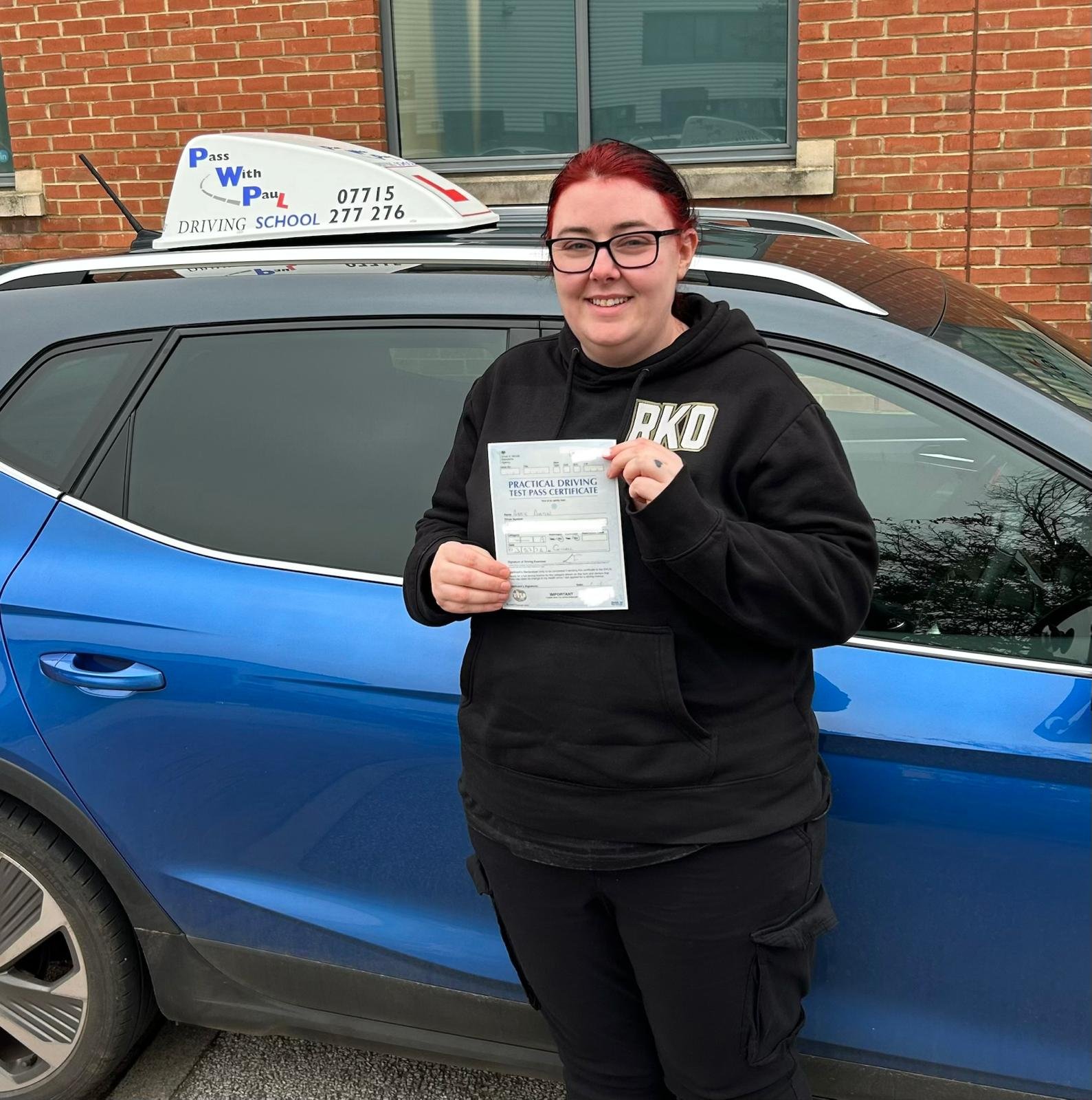 PWP Driving School learner celebrating a driving test pass