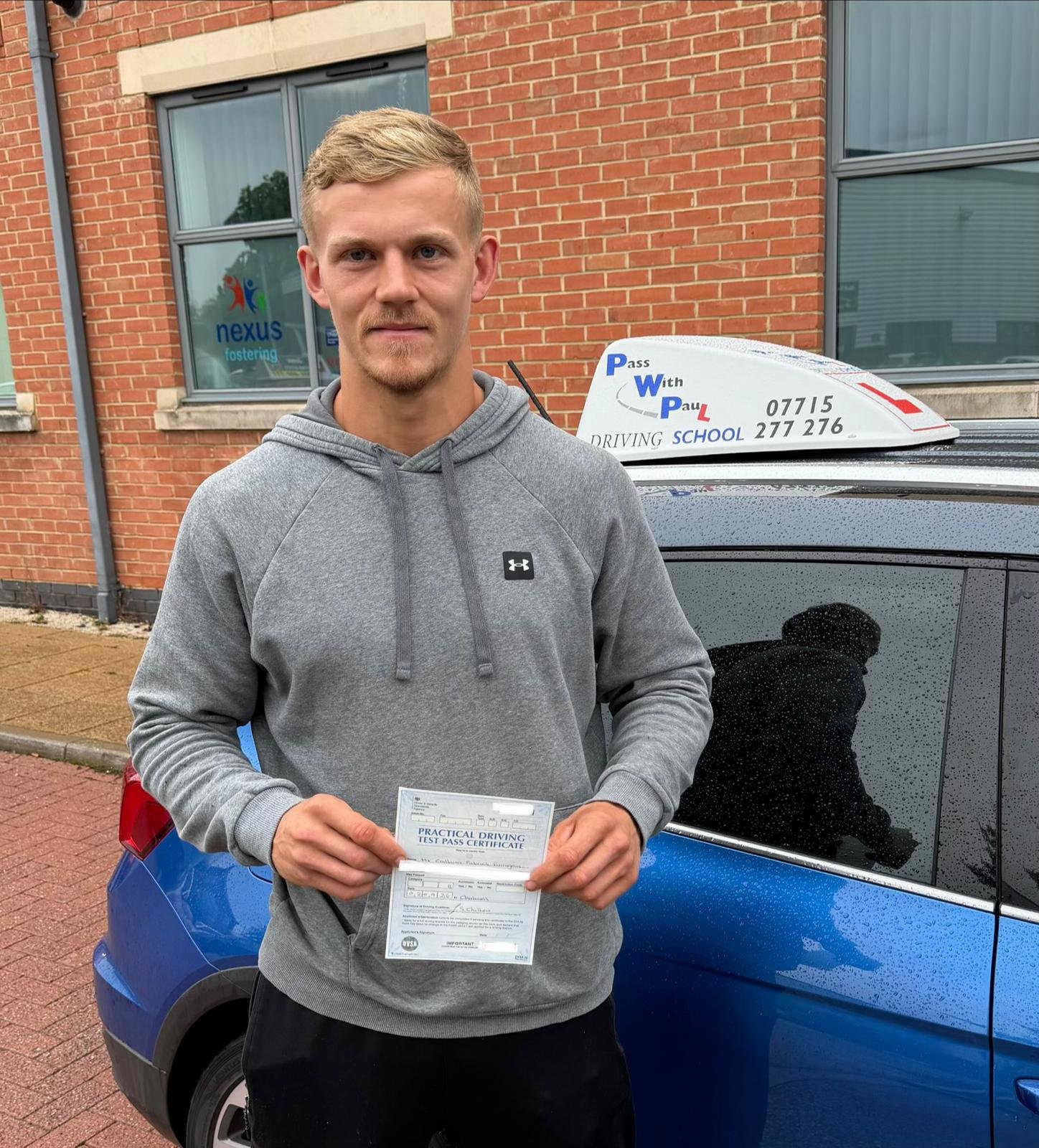 PWP Driving School learner celebrating a driving test pass
